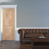 Door with sofa in empty room interior scene